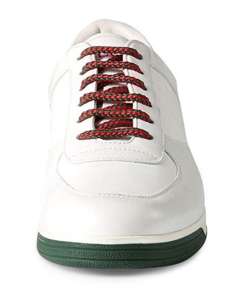 gucci white low top sneakers.